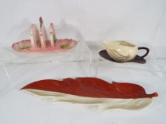 Carlton Ware - four pieces comprising a leaf tray, a toast rack,