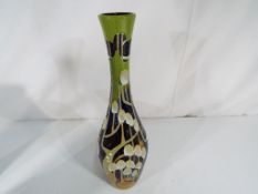 Moorcroft Pottery - a Moorcroft pottery vase in the Fairy Inkcap pattern,