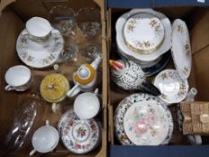 A good mixed lot containing two boxes of ceramics and glassware comprising teapots,