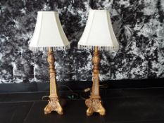 A matching pair of table lamps, approximately 78 cm (h).