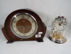 A good quality mantel clock Arabic numerals to the dial, marked Smiths Enfield Made in England,