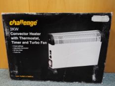 Unused retail stock - a Challenge 2kw convector heater with thermostat timer and turbo fan,