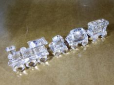 Swarovski - a Swarovski crystal train comprising four pieces