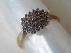 A lady's hallmarked 9ct gold cluster ring set with 0.
