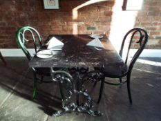 A faux marble table with cast iron supports, approximately 74 cm (h) x 76 cm x 76 cm.