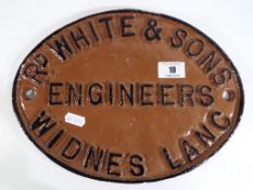 An oval cast iron works plate marked R.