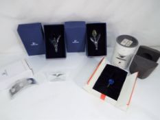 Swarovski Crystal - a limited edition Swarovski crystal tulip set with stand to include the 2002