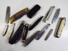 Fourteen assorted penknives