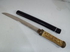A replica Japanese wakizashi short sword,