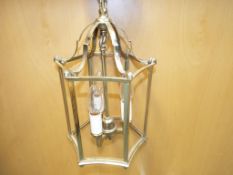 A good quality solid brass Chelsea lantern with all six pieces of curved glass present.