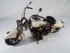 A tin plate Harley Davidson style motorbike Est £30 - £50