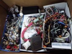 A very large quantity of unsorted costume jewellery to include brooches, necklaces,