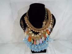 Unused Fashion Jewellery - three lady's statement evening necklaces (display stand not included)