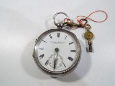 A gentleman's hallmarked silver cased pocket watch, Chester assay 1894, key wind movement with key,