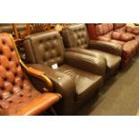 Pair brown buttoned easy chairs