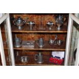 Collection of silver plated ware including tea set and olive wood egg stand