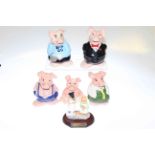 Five Wade Natwest pigs and Beswick Ginger and Pickles group,