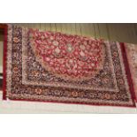 Keshan carpet with a red ground 2.30 x .