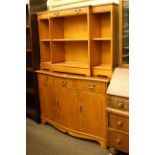 Strongbow yew breakfront open bookcase and Strongbow yew serpentine front three door sideboard (2)