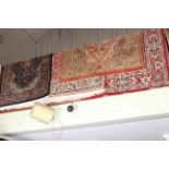 Collection of four various rugs including Ziegler and Indian