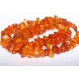 Amber coloured bead necklace