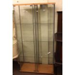 Pair of glazed four sided shop display cabinets