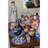 Collection of Oriental ceramics including bowls, vases, plates, figure,