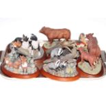 Eight Border Fine Arts ornaments including Fox Family, Eager to Learn, Forest Family,