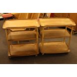 Pair of Ercol Windsor three tier trolleys