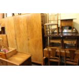 Six piece 1930's rosewood bedroom suite comprising triple wardrobe, dressing table, linen chest,