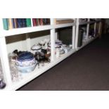 Full shelf of glass, china, dinnerware, cases, table lamps, toilet mirrors, wall mirrors,