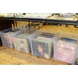 Four boxes of vinyl records including Beatles, Pink Floyd, Fleetwood Mac,