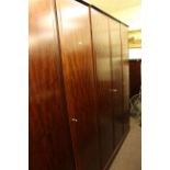 Stag Minstrel eight piece bedroom suite comprising triple and double wardrobes, five height chest,