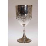 A LARGE VICTORIAN SILVER GOBLET, London 1871, embossed with swags of foliage,