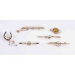 A COLLECTION OF SIX GEM SET BROOCHES, to include a three stone diamond set split bar brooch,