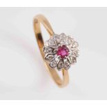 A DIAMOND AND RUBY RING,