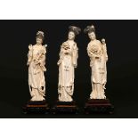 A SET OF THREE CHINESE IVORY FIGURES, early 20th Century,