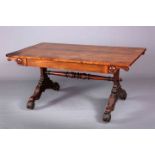 A GEORGE IV ROSEWOOD LIBRARY TABLE, the crossbanded top with rounded corners,