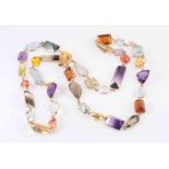 A MULTI GEMSTONE NECKLACE, set throughout with large graduating round cut, pear cut,