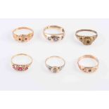 A COLLECTION OF SIX EARLY TO MID VICTORIAN RINGS, each set with gemstones to include sapphire, ruby,