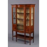 AN EDWARDIAN INLAID MAHOGANY VITRINE, with bowed breakfront section fitted with a door,