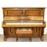A STEINWAY & SONS ROSEWOOD CASED UPRIGHT PIANO, no. 104722; with a piano stool.