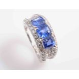 A SAPPHIRE AND DIAMOND RING,