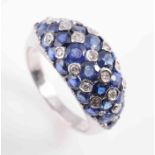 A SAPPHIRE AND DIAMOND RING BY VAN CLEEF AND ARPELS,