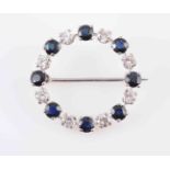 A SAPPHIRE AND DIAMOND ROUNDEL BROOCH,