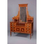 AN EDWARDIAN SATINWOOD AND MAHOGANY DRESSING TABLE, with long swing mirror flanked by drawers,