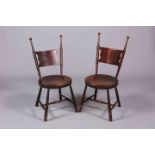 A PAIR OF ARTS & CRAFTS STAINED BEECH CHAIRS IN MANNER OF WILLIAM BIRCH, with splayed legs.