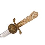 A SOUTH GERMAN HUNTING SWORD, with carved ivory grip, 18th or 19th Century. Blade 48.