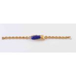 A LAPIS LAZULI AND YELLOW METAL BRACELET, circa 1880-1890,