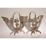 A FINE PAIR OF DUTCH IMPORTED SILVER VASES, London 1899,